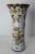 French faience vase from Rouen manufactures. Features hand painted floral decor in a blue, orange, white and yellow and...