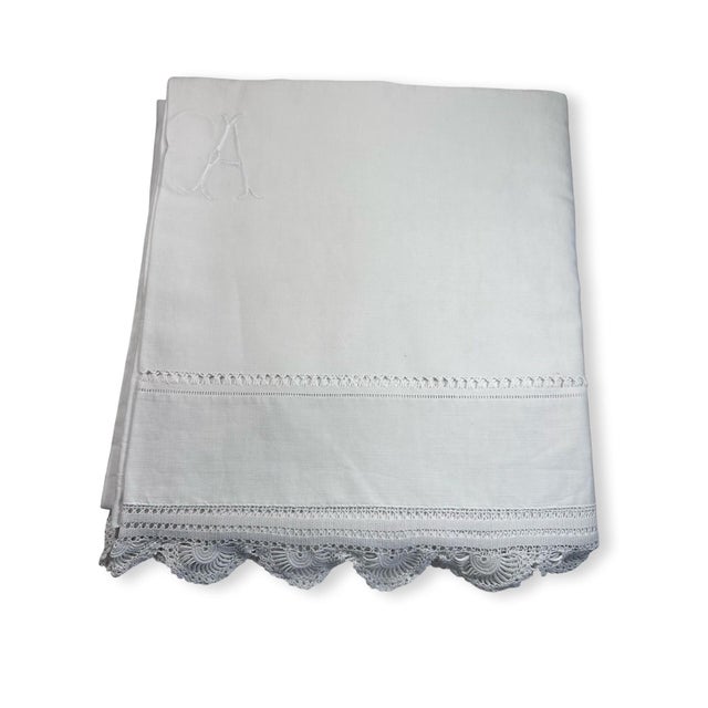 An absolutely exquisite antique French linen top sheet, made from remarkably fine, supple white linen with a beautiful...