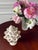 Timeless and classic, a white ceramic vase is a wonderful way to show off colorful spring flowers. This all white ceramic...