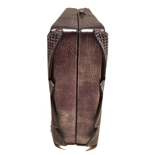 GORGEOUS Tonya Hawkes Silver Metallic Embossed and Laser Cut Leather Clutch in excellent condition. Silver leather...