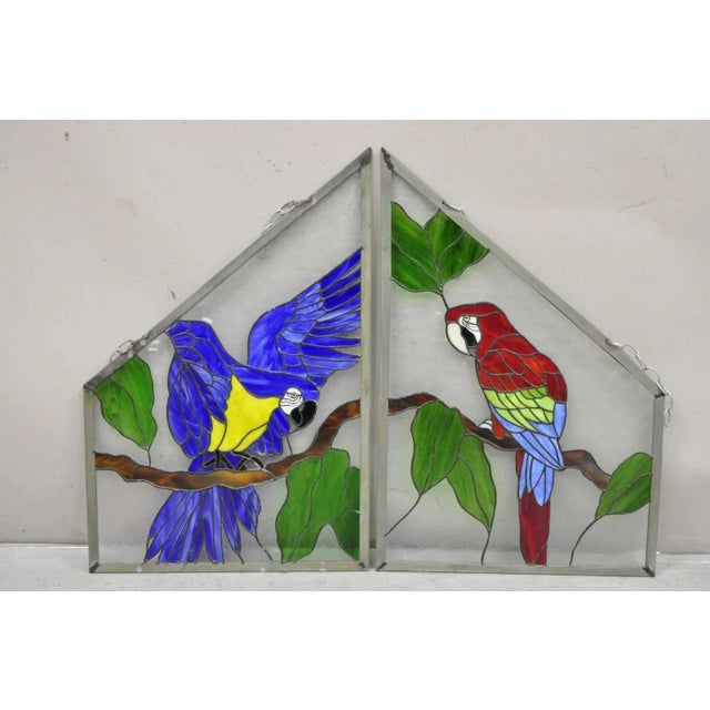 Vintage Leaded Stained Glass Red and Blue Parrot Bird Window Suncatcher - a Pair. Circa Late 20th Century. Measurements:...