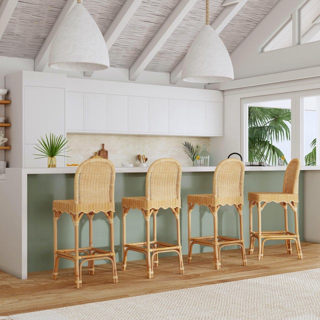 Elevate your space with our Butler Specialty Company Flora natural rattan bar stool. Crafted with love, its hand-woven...