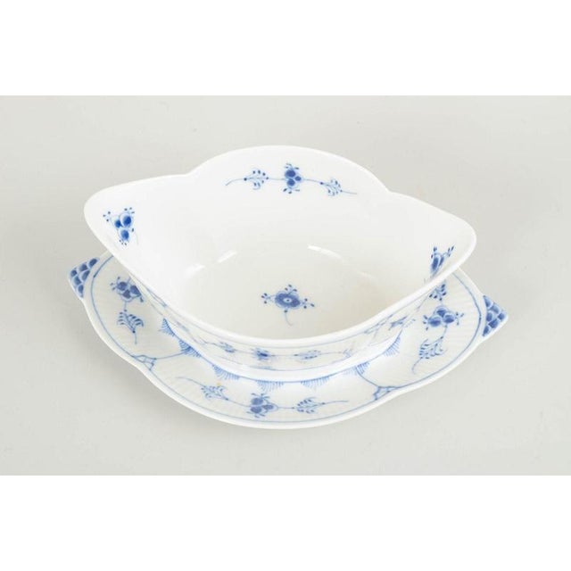 Royal Copenhagen Blue Fluted Plain sauce boat with fixed stand, 1967. Classic sauce boat in Blue Fluted Plain with an...