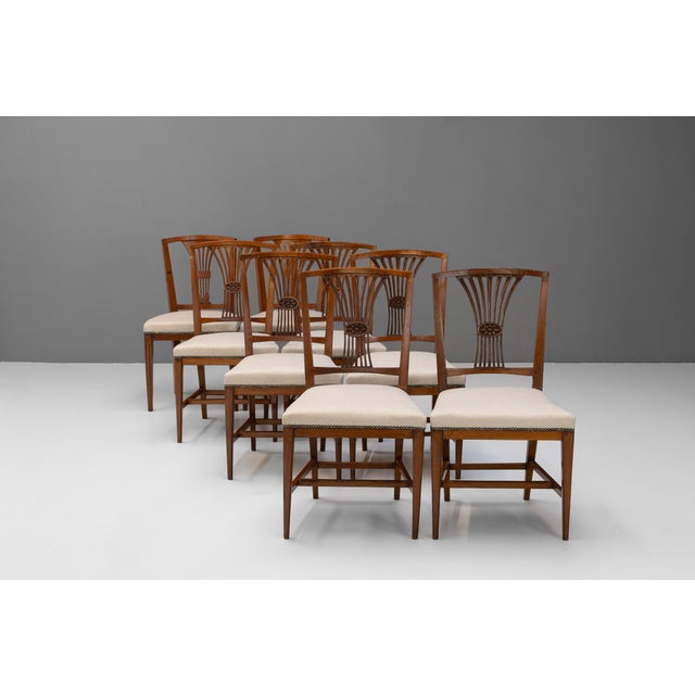 Set of 8 ( 6 + 2 similar ) French dining chairs on square tapered legs united by stretchers in elm with reupholstered...