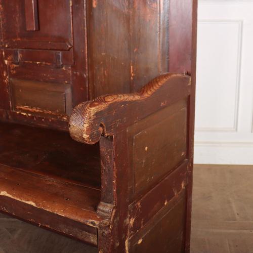 Wonderful 18th century Spanish painted pine settle with a drop down table. 1780. Seat height is 24 inches. This piece is...