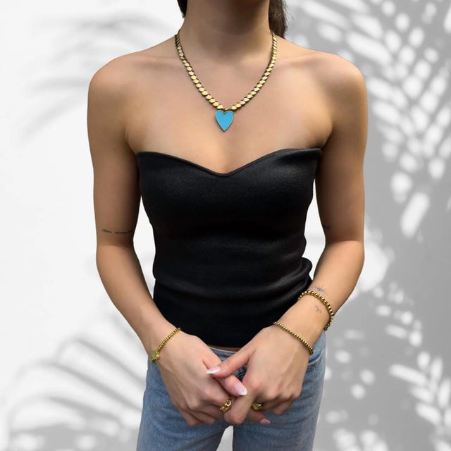 This exquisite necklace is a harmonious blend of elegance and meaning, designed to be both a stylish accessory and a...