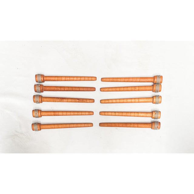 Our Spool Set comes in a grouping of ten. These were used originally in textile mills for thread. spools can make a...