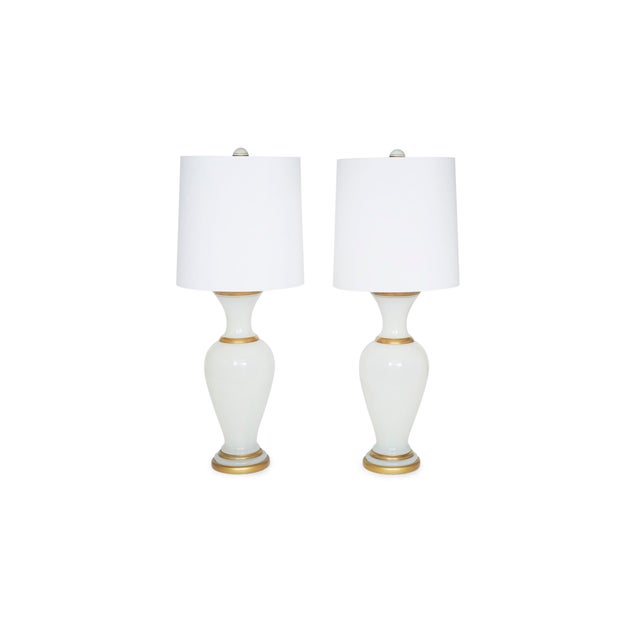 Opaline glass with gold bands trimmed design detail hollywood regency stylish pair of table lamps. Each lamp is in great...