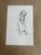 A delicate ink sketch of a mid-century inspired female figure, capturing elegance through minimal linework. The expressive...