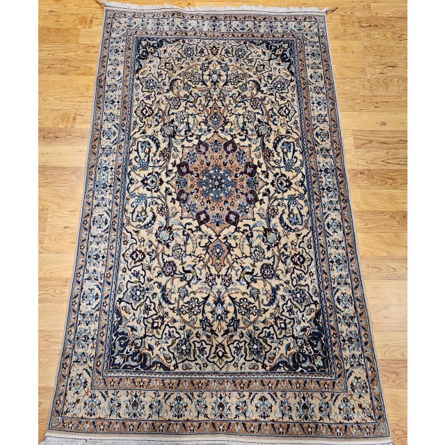 "This vintage Persian Nain area rug from the 3rd quarter of the 1900s is a stunning example of classic Persian artistry....