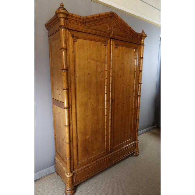 Bamboo-style cabinet in pitch pine. cabinet in pitch pine, imitating bamboo, dating from the first half of the 20th...