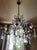 Superb Louis XV style crystal chandelier bronze frame with 6 lights, many details: flower cups, blue Murano glass drops...