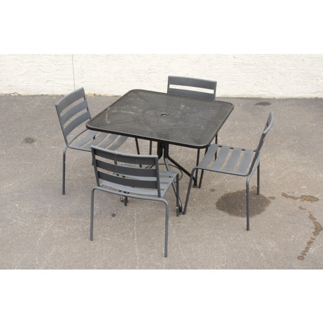 High Quality Wrought Iron Outdoor Patio Dining Table and Set of Four Matching Chairs, by Woodard (Not Labeled)