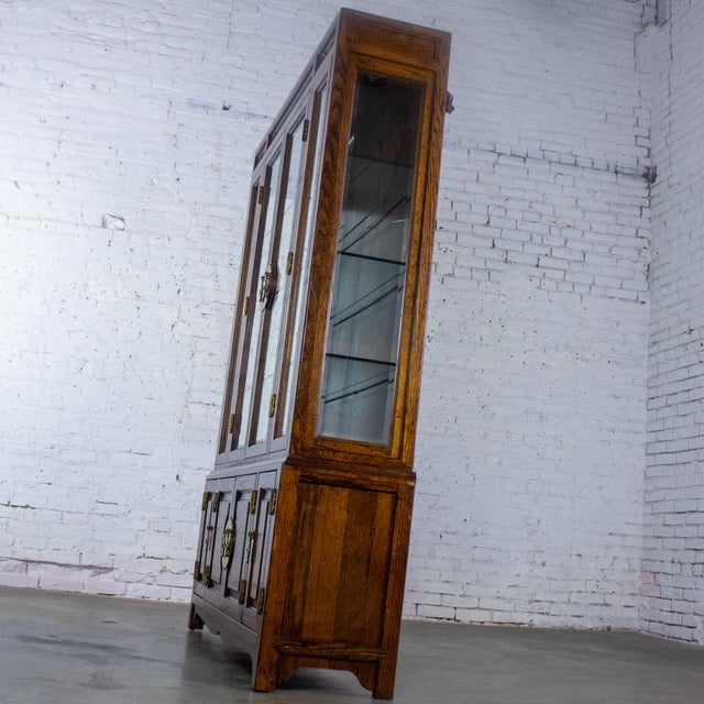 Late 20th Century Campaign or Chinoiserie Style Lighted China Hutch by Bernhardt Dark Oak & Brass For Sale - Image 11 of 18