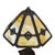 An antique Bradley & Hubbard Arts & Crafts table lamp, dating to approximately 1920. This lamp features an eight-panel...