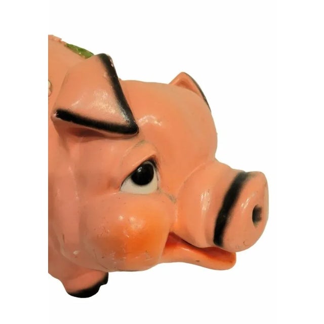 A very large vintage resin pink and green piggy bank room decor. This is a real bank with a slot on the top and a stopper...