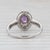 Gemstone Information: - Natural Amethyst - Carats - 0.60ct Cut - Oval Color - Purple - Natural Diamonds - Total Carats -...