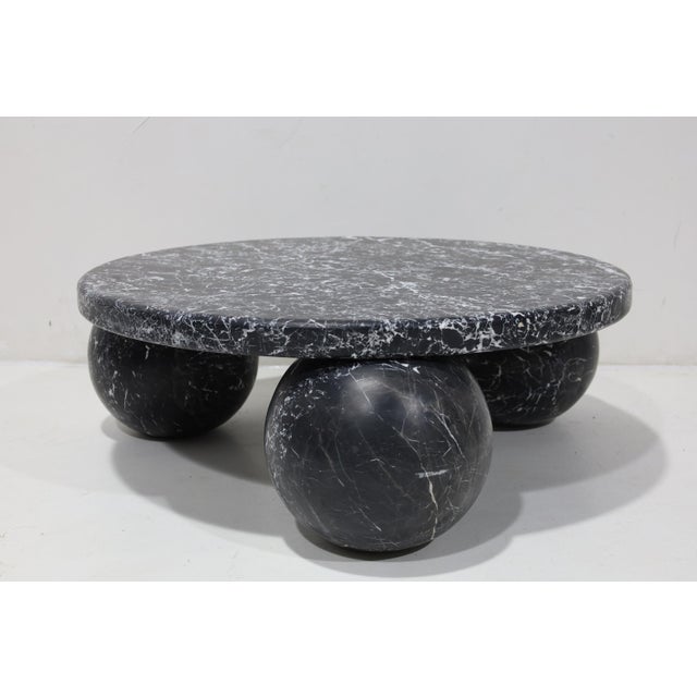 From Kelly Wearstler website: Hand carved from solid stone, the Morro Coffee Table exemplifies modernity through geometric...