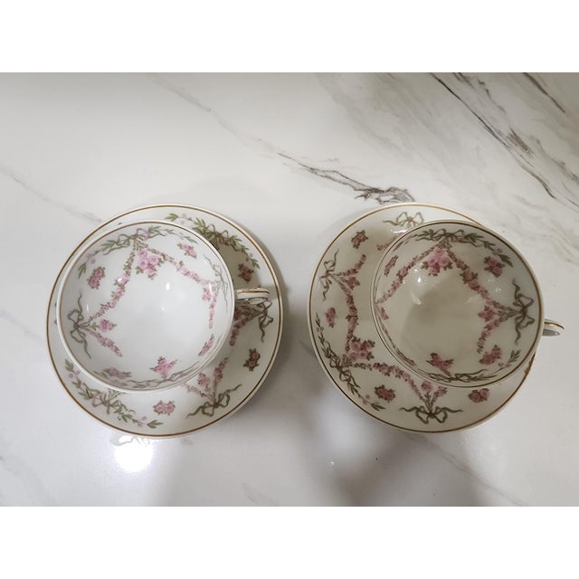 These finely made teacups are in excellent condition and perfect to add to your collection. Graced with a delicate Pink...