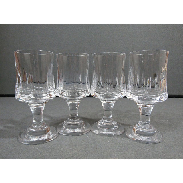 A handsome set of four vintage cordial glasses distinguished by their unusual Mid-Century European-inspired form and...