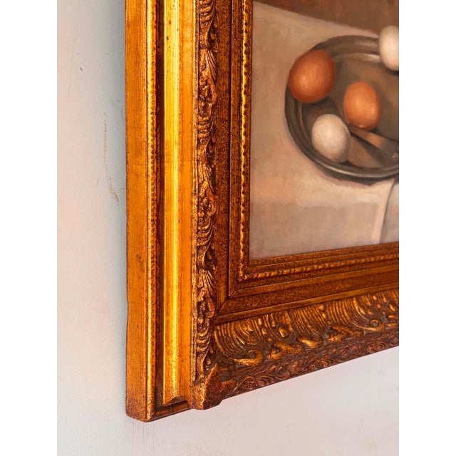 Beautiful antique still life oil painting featuring eggs arranged on a metal tray alongside rustic kitchen and household...