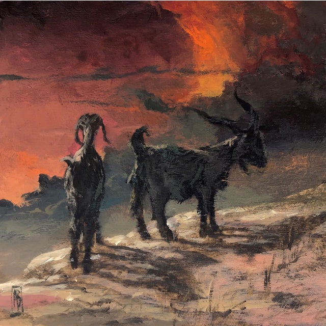 The artwork depicts two goats standing against a dramatic backdrop of swirling reds and oranges, evoking a sense of...