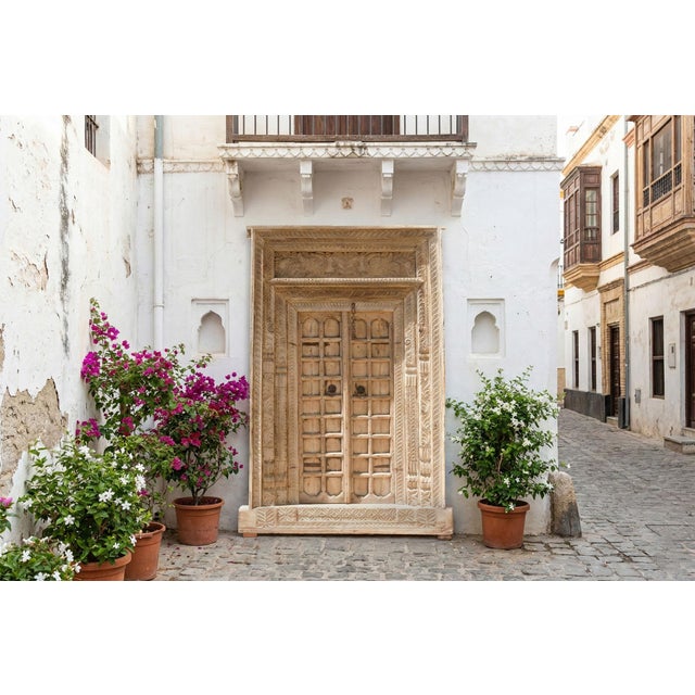 Step into a world of profound history and spiritual significance with this magnificent massive antique Indian door....