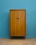 A mid-century teak compact wardrobe from Lebus from the Link range, circa 1960s. The wardrobe includes a clothes rail and...