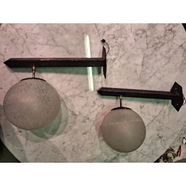 Wall Lights in Black Lacquered Iron and Brass with Etched Sphere, 1960s, Set of 2, in Good conditions. Designed 1960 to...