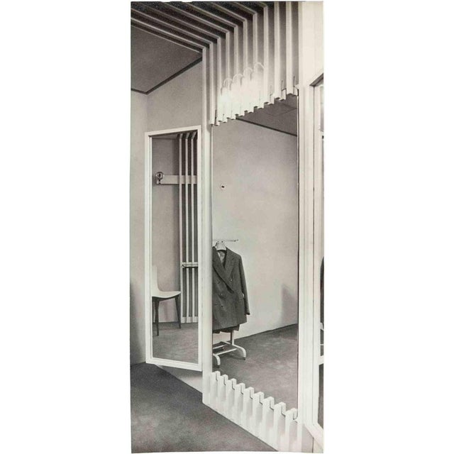 Vintage black and white photograph showing the interior of a fashion salon, most probably the NK Department Store...