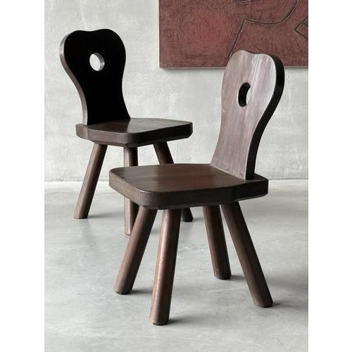 A Set of 4 Massive Pine Chalet type Chairs in Brutalist style. The scale and outline of these chunky chairs is very...