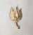Circa 1960 goldtone textured tulip brooch with security clasp. Marked crown "TRIFARI" on the back. Measures: 1 1/8 inches...