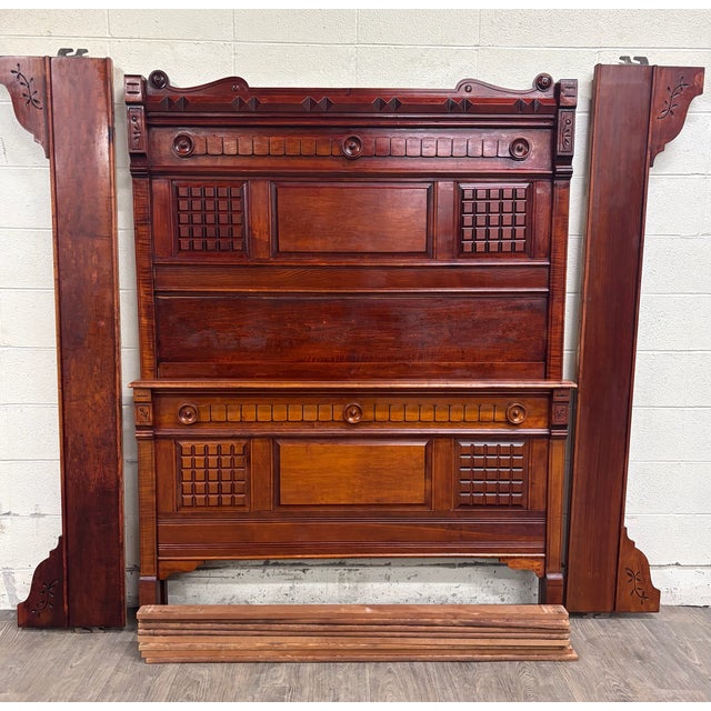 This is an exceptional late 19th-century Victorian Eastlake Monumental high back full-size bed, circa 1880–1890, crafted...