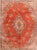The floating flower sprays in the otherwise open rust-red field are a trace of the "American style" pattern, as are the...