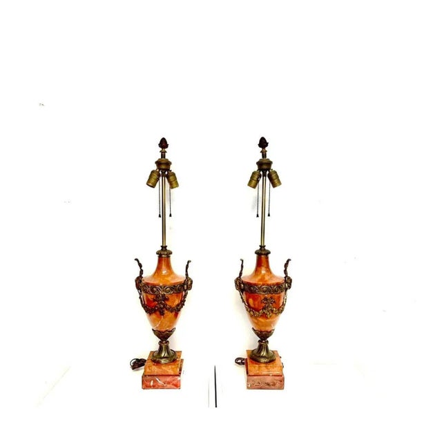 Amazing pair of heavy brass and Marble table lamps in good working condition.. Both turn on and work perfectly.. The...