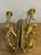 This vintage pair of Italian solid brass cherub wall sconces exudes old-world charm and elegance. Crafted with intricate...