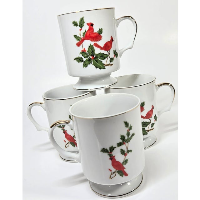 Vivid red and green pop out of this vintage 80s set of Lefton mugs. Each of the mugs still has the original gold sticker,...