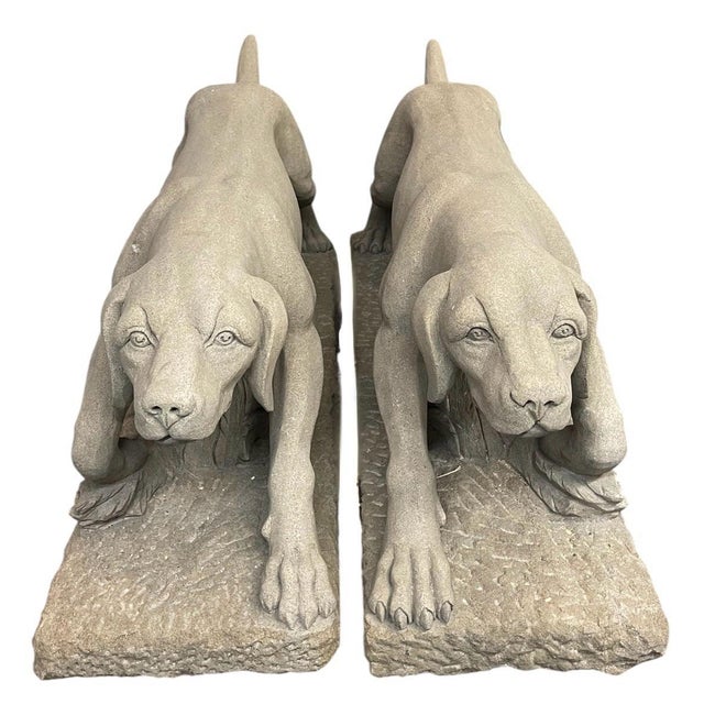 This magnificent pair of vintage cast stone statues captures the dynamic strength and heightened alertness of hunting...