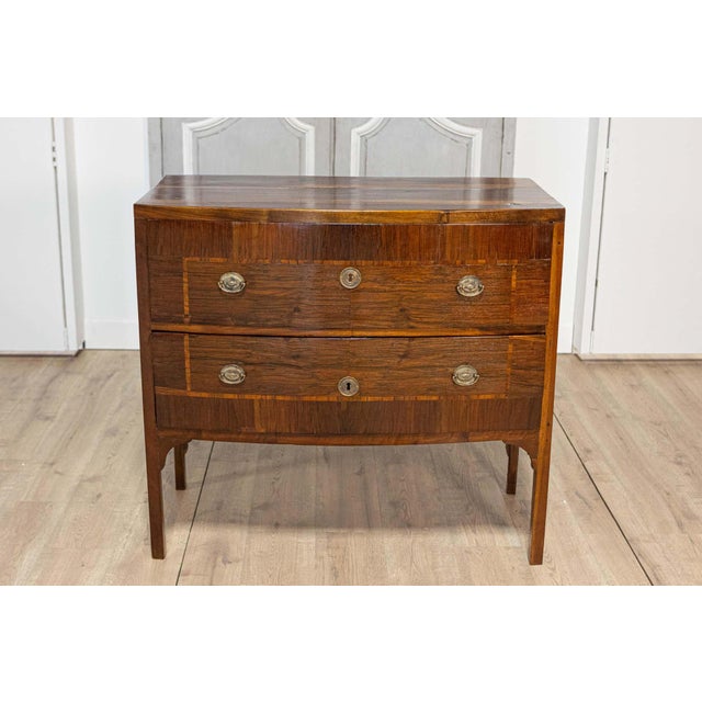 This exceptional 17th-century Italian commode is a striking example of Baroque craftsmanship, crafted from richly grained...