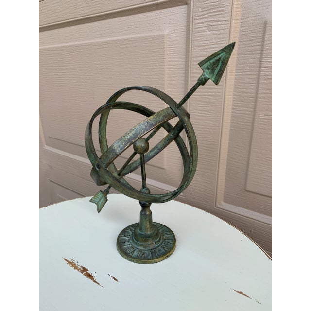 A beautifully crafted iron armillary sphere, evoking the timeless elegance of classical European gardens. Pieces like this...