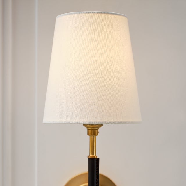 Bryant Wrapped Sconce in Hand-Rubbed Antique Brass and Chocolate Leather with Chocolate Leather Shade Designer: Thomas...