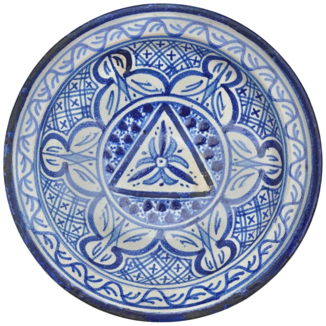 One-of-a-kind antique handcrafted and glazed Moroccan ceramic plate from Fez. Featuring an elaborate hand-painted fine...