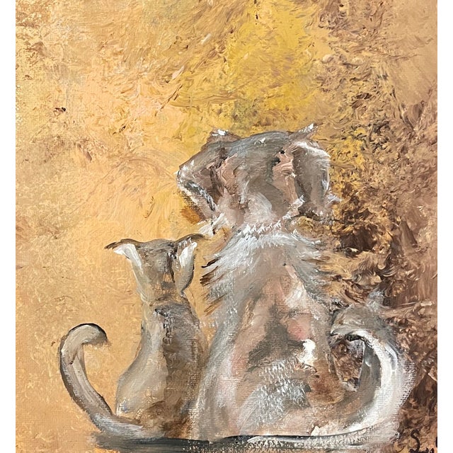 1990s oil on canvas board of a dog and cat that seem to get along. Signed in initials lower right. Original price tag from...