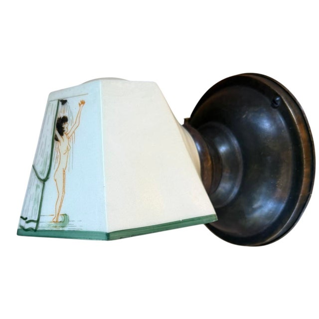 A rare wall sconce! Perfect for a pool house, bathroom or cabana. Handpainted girl in shower on painted brass holder with...