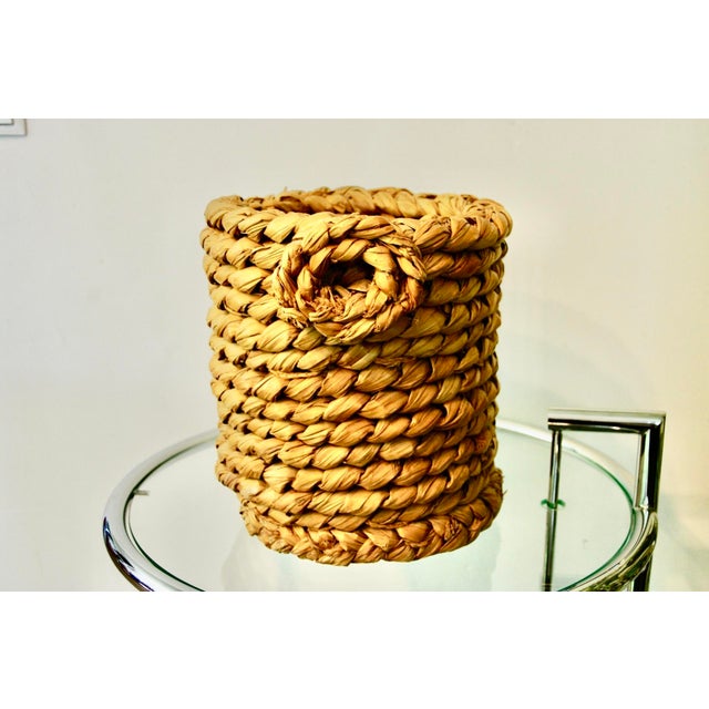 Rare Audox Minet woven rush wastebasket in good condition. This piece is attributed to the mentioned designer/maker. It...