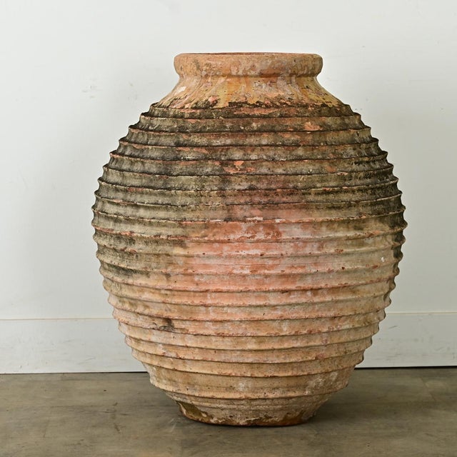 Dimensions: 34” H x 29” W x 29” D An impressive Greek olive jar from the 18th century, this antique vessel was once used...