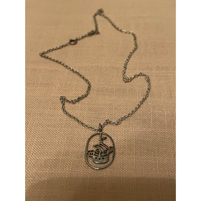 Sterling Silver Necklace With a Multi-Masted Sailing Ship Pendant Inside an Open Oval Wire Frame For Sale In Los Angeles - Image 6 of 6