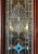 Large pair of antique late 19th century mahogany Victorian stained glass sliding pocket doors featuring intricate stained...