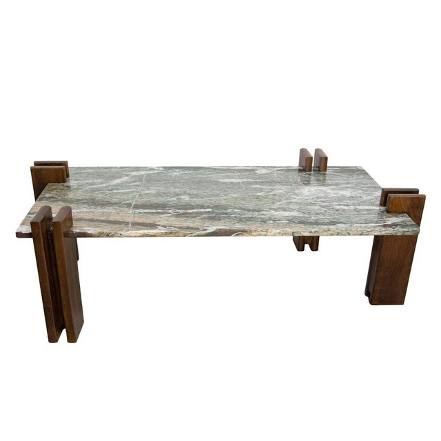 French marble top and walnut coffee table in the Celina Decoracões style. Made in the 20th Mid-century period. Marble...