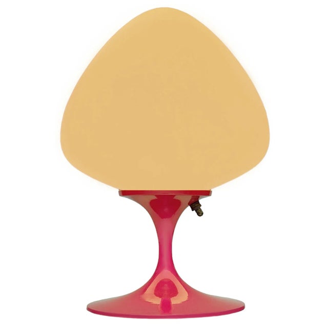 ENJOY FREE CONTINENTAL USA SHIPPING! A classic retro designed stemlite table lamp made by Design Line. The lamp features a...